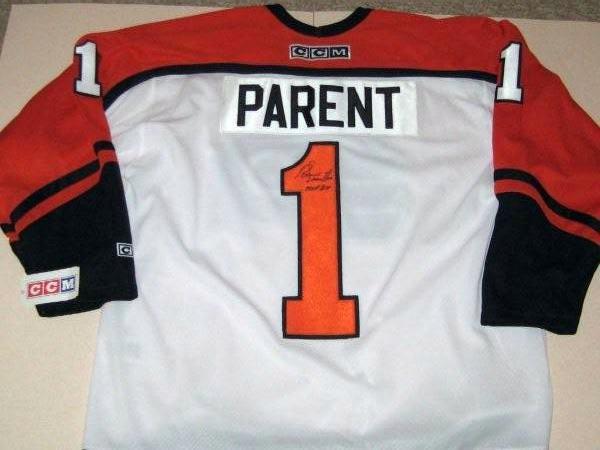 Mitchell & Ness Philadelphia Flyers Bernie Parent #1 '74 Blue Line Jersey, Men's, Small, Orange